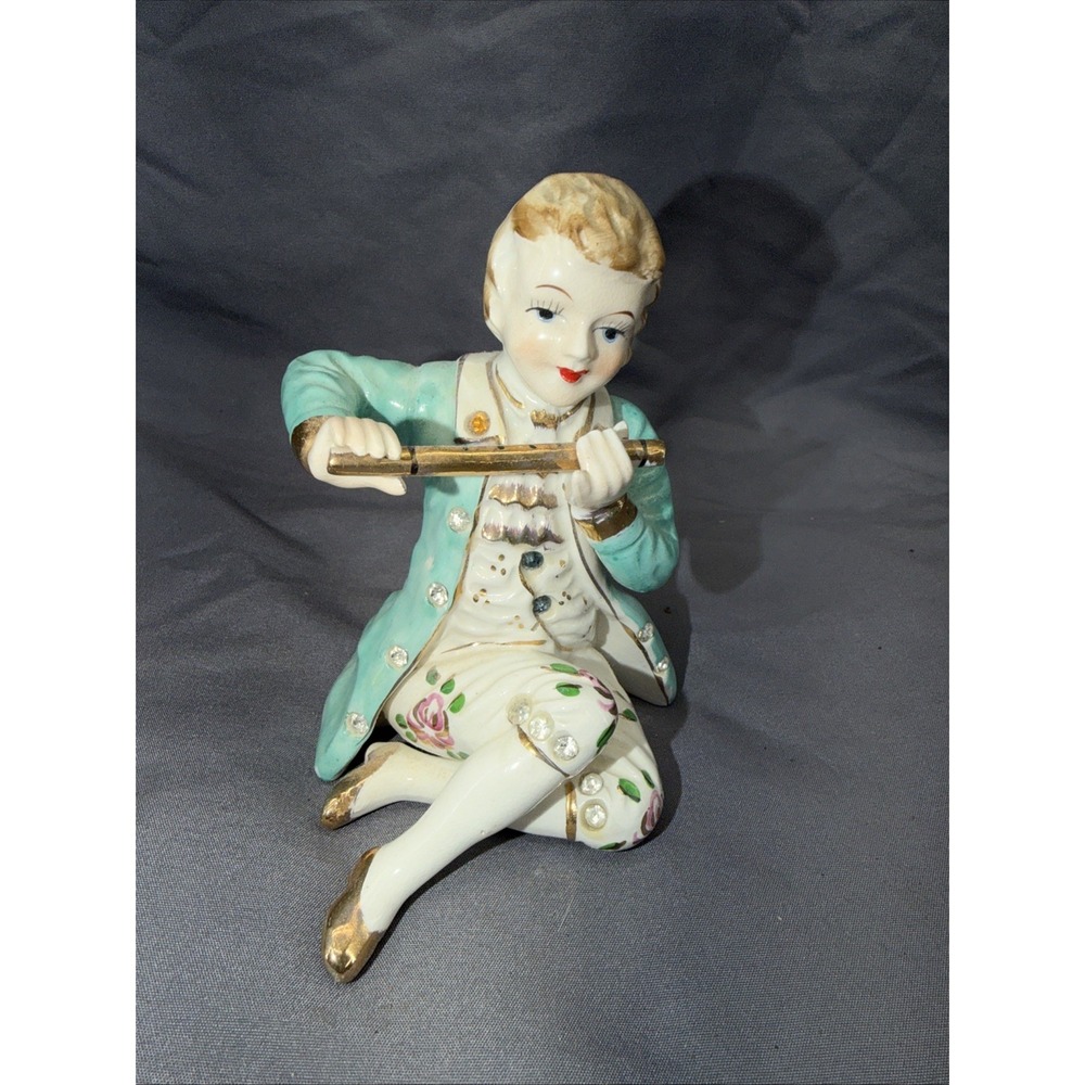 Porcelain Boy Playing a Flute 4.5"